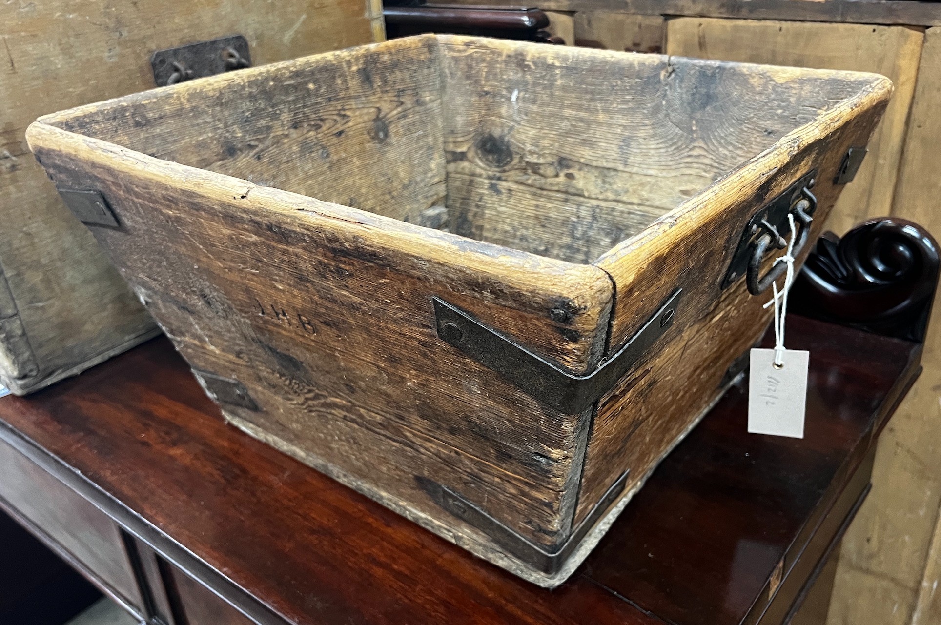 A Victorian iron bound pine garden trough, initialled J H B, width 47cm depth 45cm height 27cm